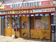 an old fashioned deli grocer store on the street