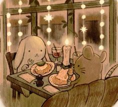 two stuffed animals sitting at a table with food in front of them and lights on the window