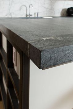 a kitchen counter top that is made out of concrete