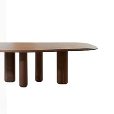 a wooden table with three columns on the top and one column at the bottom, against a white background