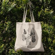 "Say no to plastic with this trendy aesthetic tote bag. Designed to make you look cute while helping the earth, this canvas tote bag is perfect for your next trip to the grocery store, mall, beach, or library.  The details: -100% cotton sheeting -Reinforced handle stitching  -15.75\" H x 15.25\" W -Handle is 21.5\" in length  -       Printed in the USA" Shoulder Aesthetic, Tote Bag School, Butterfly Tote Bag, Aesthetic Bag, Tote Bags For School, Aesthetic Tote Bag, School Tote, Tote Bag Aesthetic, Aesthetic Bags