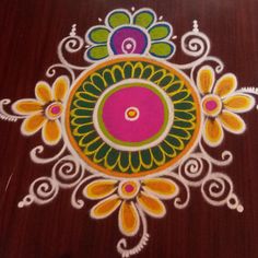 an intricate design on the floor with colorful colors