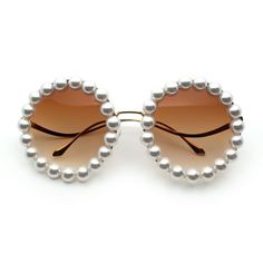 Perfectly retro, both iconic and trendy, these are surely the most fun shades for you this season. Inspired by the 70s music scene, these will bring out your inner hippie vagabond spirit. Perfectly circle round silhouette with super blingy pearl jewel trim. Classic gradient 100% UV400 polycarbonate lens will give you a perfect pimpy vibe. Made with alloy metal frame, adjustable English style nose pads, and reinforced metal hinges. (c734) Size: 52-26-129.  Color: Brown.  Gender: female.  Age Grou Round Eyewear, Pearl Jewels, Aviators Women, 70s Music, Aviator Sunglasses Mens, Metal Hinges, Round Circle, Metal Sunglasses, English Style