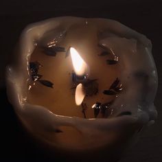 a candle that is in some kind of bowl