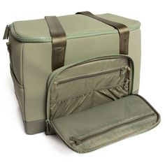 Get up and go with baby in tow. Constructed of on-trend neoprene in sage green, this weekender diaper bag is lightweight, weather-resistant and machine washable. The versatile bag can be worn as a backpack, shoulder bag and crossbody carryall and fits most airline carry-on size limits. Boasting an abundance of pockets for all of your and your baby's essentials, the weekender accommodates a laptop and includes multiple mesh pockets, a key clip and a changing pad. This diaper bag makes a lovely sh Functional Green Rectangular Luggage, Large Capacity Green Rectangular Luggage, Functional Diaper Bag With Zipper Pocket For Weekend Trips, Functional Green Luggage For On-the-go, Large Capacity Green Nylon Gym Bag, Green Nylon Duffle Bag With Large Capacity, Functional Green Weekender Bag For On-the-go, Green Nylon Travel Bag With Large Capacity, Green Large Capacity Luggage For Everyday Use