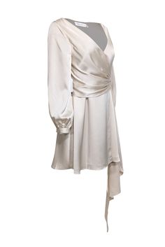 Introducing the "Eccles" wrap dress by Fame & Partners - your go-to for easy elegance at any special event. This dreamy satin piece boasts a flowy silhouette, blouson sleeves, a waist sash, and a flirty hemline. Pair with sparkling earrings and nude heels for a stunning look! Size 6 100% Polyester Lined Surplice neckline Long sleeves with buttoned cuffs Sash detail at waist Wrap silhouette w/ buttons at side Light run back of left sleeve Bust 36" Waist 29" Shoulder to hem 33.5" Sleeve length 23" Silk V-neck Wrap Dress For Date Night, Silk V-neck Wrap Dress For Night Out, Elegant A-line Wrap Dress For Evening, Flowy Surplice Neckline Mini Dress For Party, Flowy Mini Dress With Surplice Neckline For Party, Chic Flowy Wrap Dress For Party, Spring Party Silk Dress With Draped Style, Spring Party Silk Dress With Draped Design, Elegant A-line Wrap Dress For Date Night