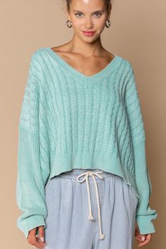 -Color: Mint -V-neck -Cable-knit -Long sleeves -Loose fit -Semi-cropped length -Ribbed on neck, cuffs and hem -Content: 100% Acrylic -Machine wash/ Lay flat to dry -Imported -Model is wearing a size Small Oversized V-neck Cropped Sweater For Spring, Cozy V-neck Sweater With Ribbed Cuffs For Spring, Spring Cable Knit V-neck Sweater, Winter Cable Knit V-neck Cropped Sweater, Cropped Knit Sweater For Loungewear, Oversized Cable Knit Cropped Sweater, Oversized Casual Cable Knit Cropped Sweater, Knit Cropped Sweater For Loungewear, Cozy V-neck Soft Knit Cropped Sweater