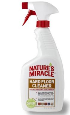 a bottle of nature's miracle hard floor cleaner on a white background with red handle