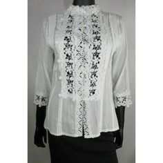 "Made With Love." Lace Collared & Lace Front Button Down Blouse. Color: White Size: Small Material: 100% Polyester Measurements: Shoulders: 15.5in. Sleeves: 17.5in. Chest: 38in. Garment Length: 23.5in. Condition: New With Tag. Excellent! New! Cotton Top For Wedding In Spring, White Button-up Top For Wedding, Classic Summer Wedding Top, Summer Wedding Top With Buttons, Summer Wedding Tops With Buttons, White Button Closure Top For Wedding, Spring Wedding Top With Button Closure, Summer Wedding Blouse With Buttons, Feminine Wedding Tops With Buttons