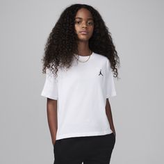 Made of soft cotton/poly jersey and featuring a small embroidered Jumpman logo, this tee is a go-with-anything piece that complements any pair of Jordans. It has a tagless crewneck for comfy wear with slightly dropped shoulders that provide a relaxed fit. Basic Tops With Embroidered Logo For Streetwear, Casual White T-shirt With Embroidered Logo, Comfy Wear, Jumpman Logo, White Style, Big Kids, Kids Tshirts, Brooklyn, Jordan