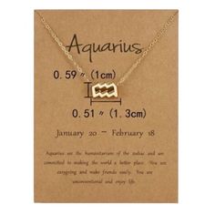 the aquarius zodiac sign necklace is shown on a card with an inscription that says aquarius