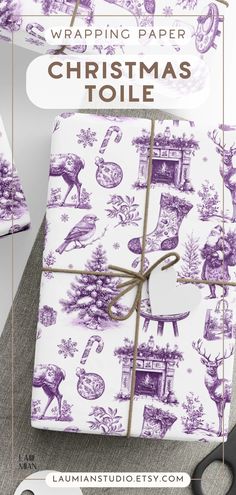 the wrapping paper is wrapped in purple and white to make it look like christmas presents