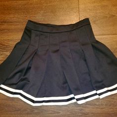 Nwt Champion Black Pleated Cheer Skirt. Size Youth Large. Got A Size Adjustable Button On The Back. Excellent Condition. New. Never Worn. 100% Polyester. Feel Free To Message Me With Any Questions Or If Wanting To Bundle With Other Stuff Before Purchasing. Thank You For Looking. :) School Uniform Tennis Skirt In Mini Length, Black Mini Skirt For School Uniform, Preppy Mini Length Black Bottoms, Preppy Black Mini Length Bottoms, Preppy Black Mini-length Bottoms, Black Mini Skort For School Uniform, Preppy Black Pleated Tennis Skirt, Black School Uniform Mini Skirt, Black Mini Skort For School