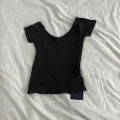 Brandy Melville Ribbed Short Sleeve Top One Size Condition: Nwt Color: Black Details : - Ribbed - Short Sleeve - V Neck Extra: - I Ship Between 1-2 Days Black Fitted Seamless Top, Black Seamless Fitted Top, Black Ribbed Fitted Tops, Black Fitted Top With Scoop Neck, Black Fitted Ribbed Top, Fitted Black Top With Scoop Neck, Black Fitted Scoop Neck Top, Black Ribbed Scoop Neck Crop Top, Fitted Black Scoop Neck Top