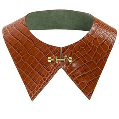 The signature Queen Collar is a versatile statement with any outfit. As a larger version of the King Collar, it has the same idea to be thrown on and instantly elevate your look. As a key piece for layering, it’s carefully crafted to sit flat under a shirt collar. Did we mention it’s reversible?! The Queen Collar is made of hand-cut leather, featuring contrast reverse side and hand-painted edging. Handmade in our Charleston, SC workshop. Materials: Leather, brass hardware Brass bar closure Varia Travel Looks, Rose Smith, Brass Bar, Ipad Sleeve, Leather Pieces, Leather Collar, Collar Jewelry, Collared Shirt, Business Casual Outfits