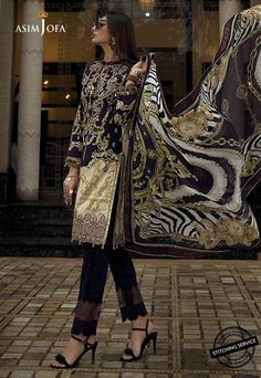 Pakistani Designer Lawn Outfit in Black Color emblazoned with beautiful print and embroidery. Asim Jofa Summer Collection is very stylish and you can wear these dresses on Party or Eid Events. Buy Online Asim Jofa new collection at this store and change your look. Shirt: Elegant Shirt in black color is embellished gold printed work front and back on lawn fabric. Sleeves are printed. Shirt neckline is decor with thin embroidered border and daman is also embellished with embroidered patch. Trouser Lawn Dress Design, Latest Pakistani Fashion, Asim Jofa, Latest Dress Design, Pakistani Lawn Suits, Lawn Dress, Pakistani Salwar Kameez, Pakistani Dress, Lawn Fabric