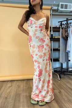 Product Deets Pink watercolor floral maxi dress Self: 100% polyester Lining: 100% polyester Floral printed silk-like material Adjustable straps Lace trim around bust Tie back detail Slight a-line Fully lined Invisible zipper and hook closure in back Size small measures 48” long from front center to bottom Runs true to size Model Info Erielle is 5’1. Waist: 24" Bust: 32A Wearing size Small. Silk Floral Print Maxi Dress For Brunch, Chiffon Maxi Dress With Spaghetti Straps And Floral Print, Flowy Spaghetti Strap Floral Maxi Dress, Flowy Floral Print Maxi Dress With Spaghetti Straps, Flowy Maxi Dress With Spaghetti Straps And Floral Print, Chiffon Spaghetti Straps Maxi Dress For Brunch, Spring Chiffon Lined Maxi Dress, Spring Lined Chiffon Maxi Dress, Spring Silk Maxi Dress With Floral Print