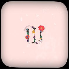 the letter m is made up of flowers