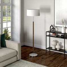 a living room scene with focus on the floor lamp