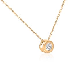 This classic women's solitaire pendant features one round brilliant cut natural diamond.  The diamond is bezel set in solid 14k yellow gold.  An 18" 14k yellow gold chain is included. Round Diamond Pendant, Diamond Flower Pendant, Solitaire Diamond Pendant, Yellow Gold Solitaire, Bezel Necklace, Solitaire Pendant Necklace, Bezel Pendant, Heart Pendant Diamond, Solitaire Diamond