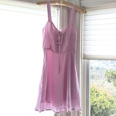 Never Worn. New With Tags. Cute Mini Dress With Sweetheart Neckline, Tie-Up Front. Double Lining In The Skirt. Hand Wash Cold Material Is Rayon (Shell) And Polyester (Lining)