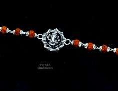 Metal-925 sterling silver. Item type-Rakhi Bracelet. Length-6 inches.to 9 inches (select you size from option ) Weight-6.200 grams.(weight will be vary as per length) Center piece size-1.8cm beads size-3 to 5 mm approx. Stamped-925. Thank You and Happy Shopping! Fusion Style Bracelets For Puja And Diwali, Traditional Silver Bracelets For Diwali, Traditional Silver Bracelet For Diwali, Sterling Silver Bracelets With Silver Beads For Festive Occasions, Silver Fusion Bracelets For Diwali, Festive Sterling Silver Bracelets With Silver Beads, Silver Hallmarked Temple Jewelry Bracelet, Silver Temple Jewelry Bracelet, Hallmarked, Ceremonial Temple Jewelry Bracelet In Sterling Silver