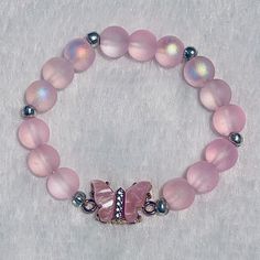 Adjustable Pink Charm Bracelet With 8mm Beads, Adjustable Pink Hand-strung Charm Bracelet, Pink Adjustable Hand-strung Charm Bracelet, Spiritual Pink Beaded Hypoallergenic Bracelets, Spiritual Pink Adjustable Stretch Bracelet, Spiritual Adjustable Pink Stretch Bracelet, Pink Spiritual Hypoallergenic Bracelets, Spiritual Pink Hypoallergenic Bracelets, Spiritual Hypoallergenic Pink Bracelets