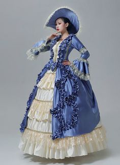 Renaissance Blue Victorian Lolita Dress for Women  Color:Blue  Material: This dress made of High Quality Satin, soft,smooth and comfortable to wear  Sleeve Length:  Long Sleeve  Dresses Length:Floor Length  Neckline:  Square Collar  Decoration: Ruffles + Lace  Package Includes:  Dress + Hat    The length of skirt about 45 inches (114 cm) long from waist to hem regardless of size. This dress is pictured with a 6-hoop skirt Petticoat underneath to achieve the look. Petticoat are NOT INCLUDED Light Blue Ruffled Ball Gown Dress, Light Blue Ruffled Ball Gown, Royal Long Sleeve Costume Dresses, Fitted Blue Ball Gown Dress, Blue Summer Dress For Costume Party, Light Blue Spring Costume Party Dress, Light Blue Spring Dress For Costume Party, Light Blue Dress For Spring Costume Party, Blue Summer Gown With Ruffles