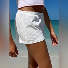 Soft Cotton Sweatshorts With An Elastic Waistband And Heart Pattern. Fabrics: 96% Cotton, 4% Elastane Measurement: 10" (25cm) Rise, 2.5" (6cm) Inseam, 28" (71cm)Waist (Stretches) Made In: Italy White Cotton Pajama Shorts For Vacation, White Pajama Shorts For Spring Vacation, White Pajama Shorts For Vacation Spring, Loungewear Shorts For Beach Season, White Pajama Shorts With Elastic Waistband For Spring, Spring White Pajama Shorts With Elastic Waistband, White Cotton Pajama Shorts, Trendy White Cotton Pajama Shorts, Casual White Pajama Shorts