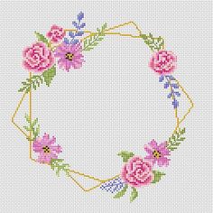 a cross stitch pattern with pink flowers and green leaves in the center on a white background