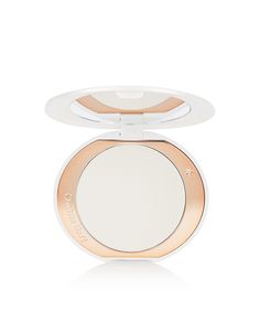 Face + Body by Charlotte Tilbury Ace your base Pressed powder Designed to brighten complexion and prevent excess shine Soft-focus micro powders aim to blurb fine lines Long-lasting, full-coverage finish Product is non-returnable for hygiene reasons