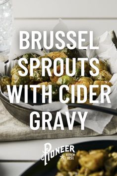 brussel sprouts with cider gravy in a pan on a table