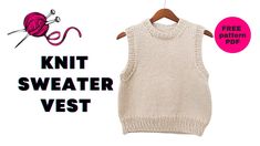 a knit sweater vest on a hanger with the knitting pattern next to it