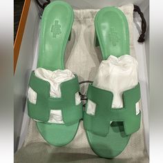 Hermes H Oasis Vert Pomme Epsom Leather Green Sandals Mule Shoes Slides 38 Brand New In Box Luxury Green Sandals With Block Heel, Green Mules With Branded Insole, Luxury Green Round Toe Sandals, Luxury Green Sandals With Round Toe, Luxury Green Closed Toe Sandals, Hermes Oasis Sandals, Hermes Oasis, Hermes Oran Sandals, Luxury Slides