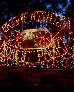 the entrance to north park is lit up with christmas lights