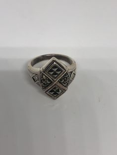 Vintage ring surrounded by Swiss cut fine Marcasite Sterling silver Size 7 can be sized by my jeweler. His service charge is $10-$20 Please request a quote. All rings are shipped free in the US in a nice gift box. Check out our over a THOUSAND great reviews Engraving is $4 per letter and is not always perfect depending on the piece. It can take a few days if the jeweler is busy. This is payable to Paypal Judithsltd@gmail.com Vintage Silver Multi-stone Rings, Formal Sterling Silver Rings With Inlay, Vintage Sterling Silver Rings With Inlay, Victorian Silver Rings With Stone Setting, Victorian Silver Ring With Stone Setting, Vintage Silver Multi-stone Jewelry, Unique Silver Ring With Inlay, Silver Sterling Vintage Enamel Ring, Vintage Silver Rings With Inlay