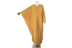 "●This loose maxi kaftan dress is a perfect oversize outfit for women, they love cosiness and comfortable feeling . ●Material: ITY polyester jersey ● Measurements: Fits until 5 XL Length: 59 inches /150 cm Bust: 64 inches / 164 cm ●Custom order are welcome ! ●Do you want the dress shorter? Just write at checkout a note for me in the section \"Note for seller\" about the!" Chic Floor-length Kaftan For The Beach, Chic Floor-length Kaftan For Vacation, Chic Floor-length Beach Kaftan, Elegant Batwing Sleeve Maxi Dress For Summer, Elegant Solid Color Maxi Length Kaftan, Long Maxi Dress For Vacation, Chic Flowy Long Kaftan Dress, Bohemian Gold Maxi Dress With Long Sleeves, Elegant Yellow Kaftan For Vacation