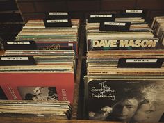 many records are stacked on top of each other