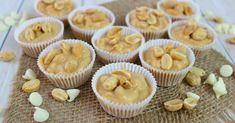 small cups filled with peanut butter and nuts