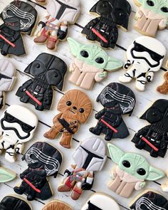 star wars cookies are arranged on a table