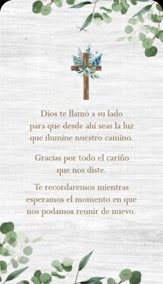 a cross and some green leaves on a white background with the words in spanish above it