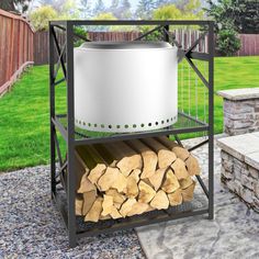 a large white pot sitting on top of a metal rack filled with firewood next to a pile of logs