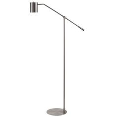 an adjustable floor lamp with a metal base and a round light fixture on the side