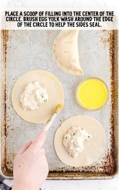 Chicken Hand Pies process shot of egg yolk being crushed on to dough