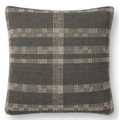 a black and white plaid pillow on a white background