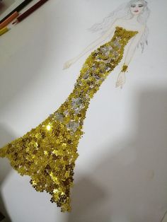 a drawing of a woman wearing a gold dress with sequins on it's skirt