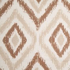 a brown and white pattern on fabric