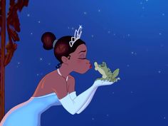 the princess and the frog kissing each other