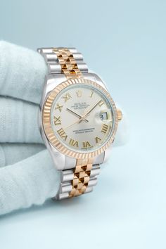 Experience luxury and style with the Rolex 178271 Datejust 31 mm Fluted Bezel watch. Made with 18K rose gold and featuring a striking pink dial, this masterpiece is sure to turn heads. The Jubilee bracelet adds a touch of elegance, completing the set with a timeless appeal. Own a piece of beauty and sophistication. Condition: Pre-owned Accessories: Original Box & Papers Warranty Dated: 2013 Details Reference Number: 178271 Model: Datejust 178271 Movement: Automatic Bezel Material: 18K Rose Gold Pink Rolex Watch Diamonds, Rolex Pink Gold Watches, Rolex Day Date Rose Gold, Rolex Watches Women 26mm, Rolex Yachtmaster Rose Gold, Rolex Usa, Picture Pendant, Cartier Watch, Rose Gold Pink