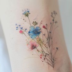 Bold Wildflower Tattoo Design Pack Wildflower Tattoo Shoulder Cap, Watercolor Wildflower Tattoo, Small Tricep Tattoo Women, Floral Wrist Tattoo Bracelets, Wildflower Back Tattoo, Wildflower Shoulder Tattoo, Tattoo Wildflowers, Wildflower Tattoo Design, Delicate Floral Tattoo